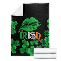 Black St. Patrick's Day blanket with green clovers and “I'm Irish” lip graphic