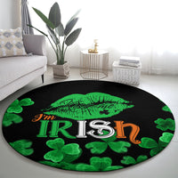 Black oval-style round rug with green kiss-lips design, “I’m Irish” lettering, and clovers