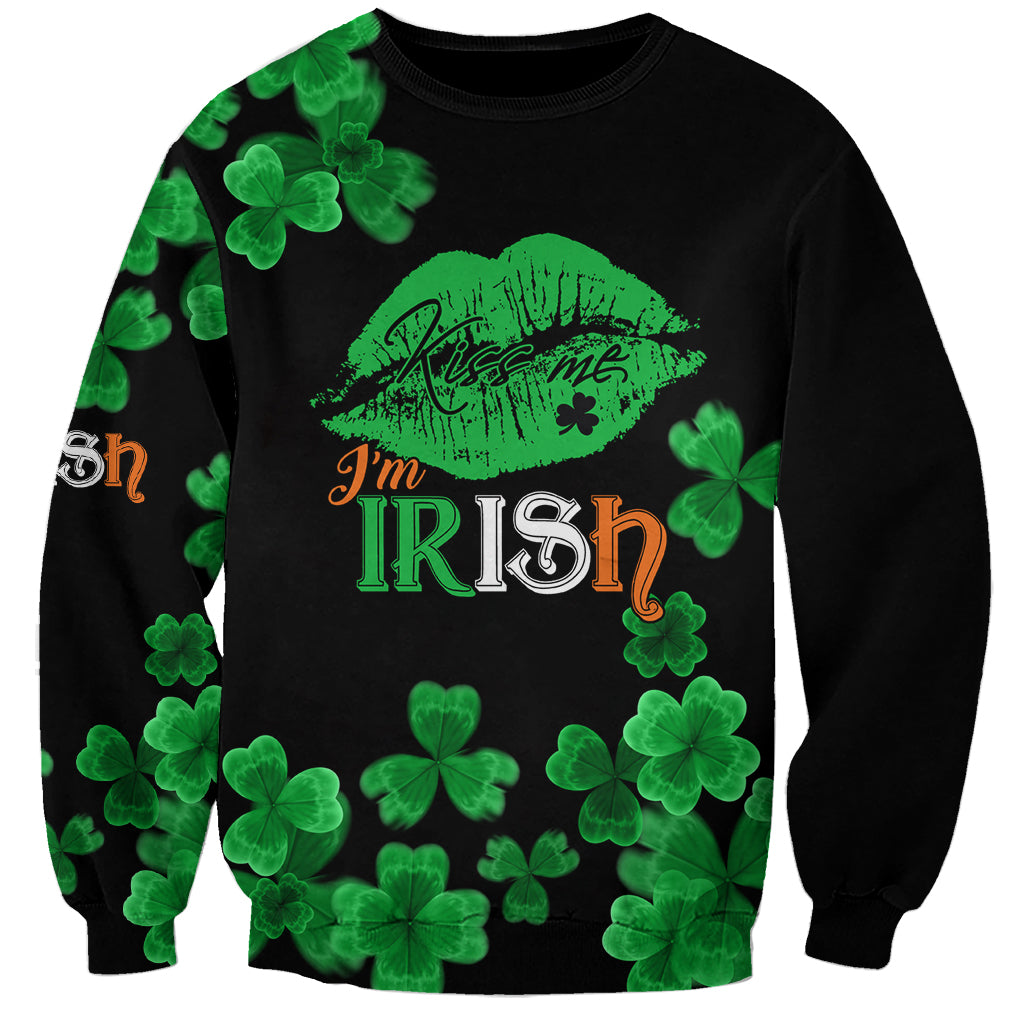 Unisex black crewneck sweatshirt with green shamrocks and Kiss Me lips Irish graphic