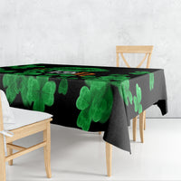 Black St. Patrick's Day tablecloth with bold green clover-leaf pattern