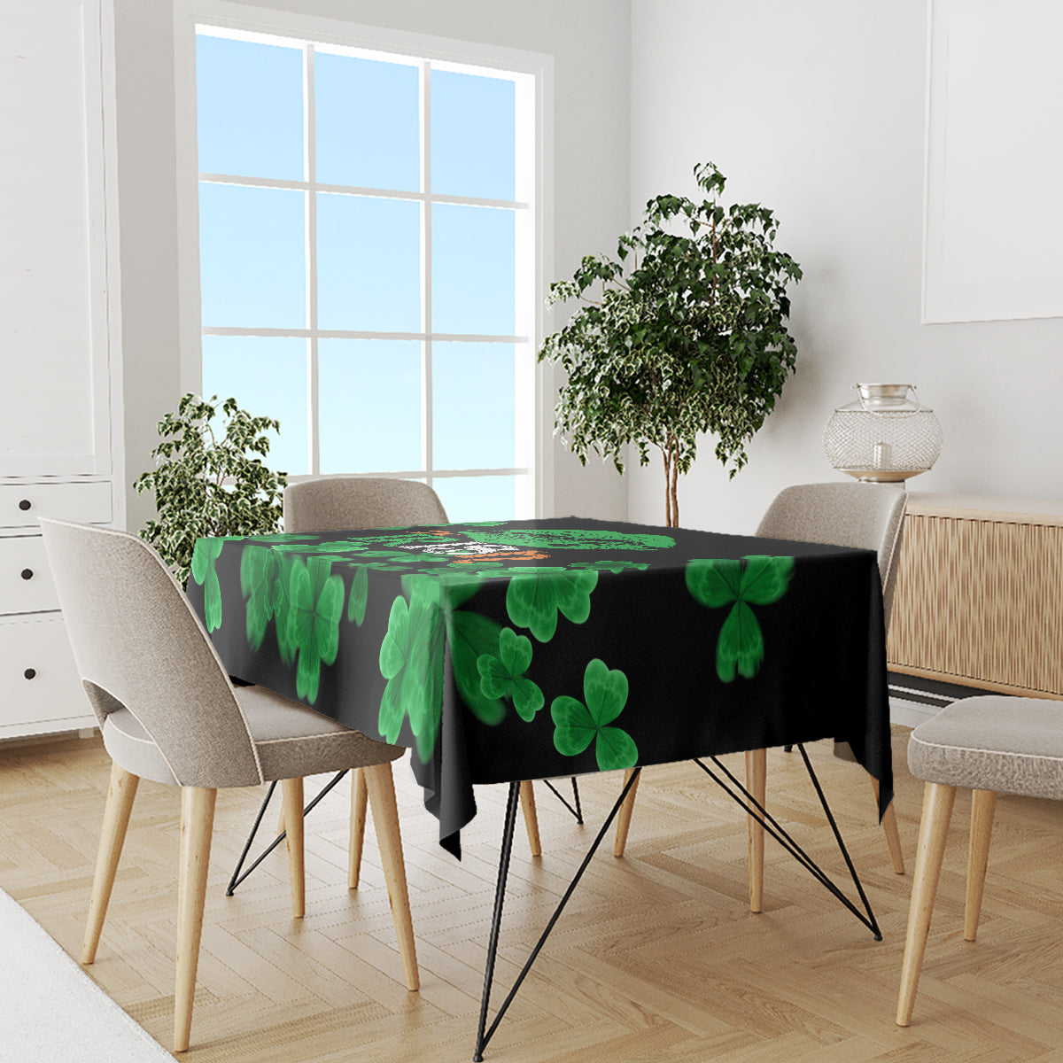 Black St. Patrick's Day tablecloth with green clover print on dining set
