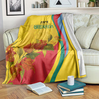 Yellow Grenada flag-style blanket featuring 1974, flower graphic, and red/green/blue curved bands