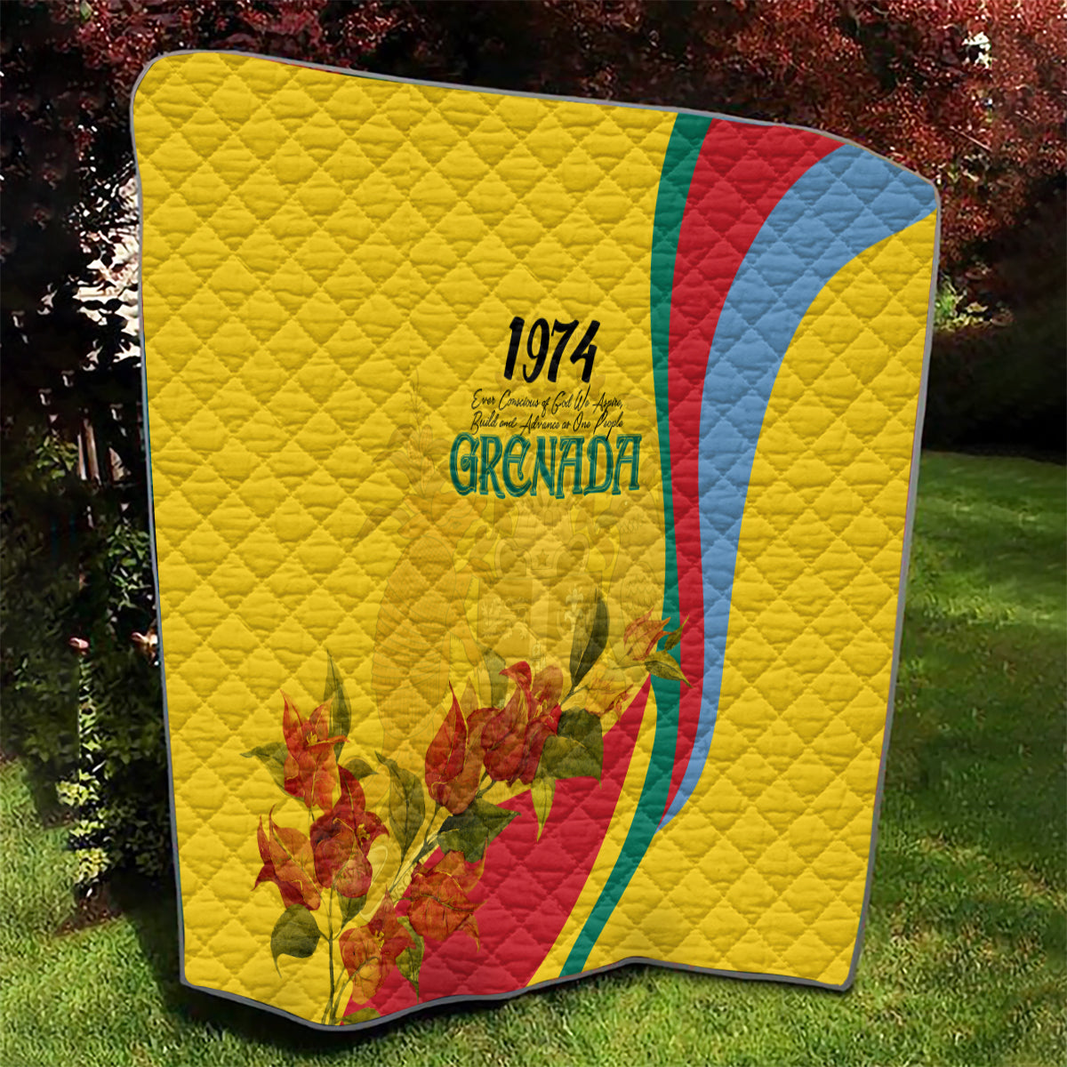 Yellow quilt with quilted texture, Grenada 1974 print, red and blue curved stripe, floral flowers