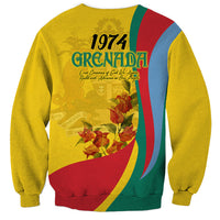 Gold crewneck sweatshirt back with 1974 Grenada floral emblem and flag-style stripe