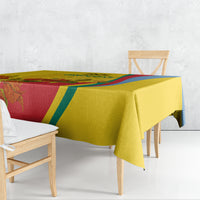 Gold flag-style Independence Day tablecloth with colorful diagonal stripe and foliage print