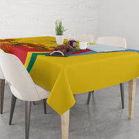 Gold tablecloth with flag-style design, diagonal stripe, and floral details
