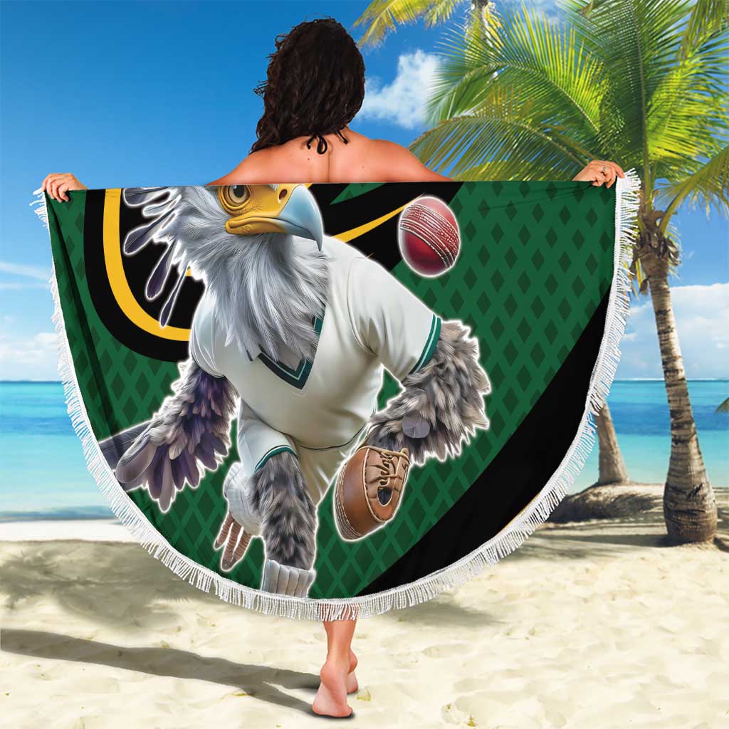 Round cricket beach blanket with green graphic of a secretary bird, fringed edge, bat and ball