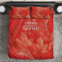 Red duvet cover set with two pillow shams, maple leaf pattern and Canada text