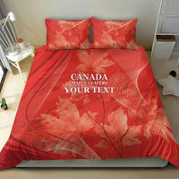 Red duvet cover set with two pillow shams, maple leaf design and Canada wording