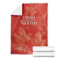 Red Canada Maple Leafs blanket with 'YOUR TEXT' and maple leaf graphics, folded view