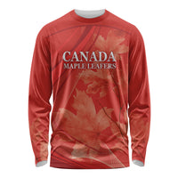 Red long-sleeve cricket shirt with Canada Maple Leafers text and maple leaf graphics