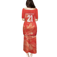 Red long dress with leaf print and back number 21, short sleeves