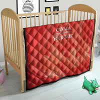 Red quilt on a crib with diamond quilting and white 'CANADA MAPLE LEAFERS YOUR TEXT' print