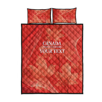 Red quilt bed set with Canada maple leaf graphic, YOUR TEXT print, and two pillows