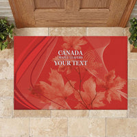 Red rectangular doormat with CANADA MAPLE LEAFERS YOUR TEXT and leaf pattern