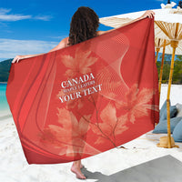 Red Canada-themed sarong with maple leaf print and centered lettering