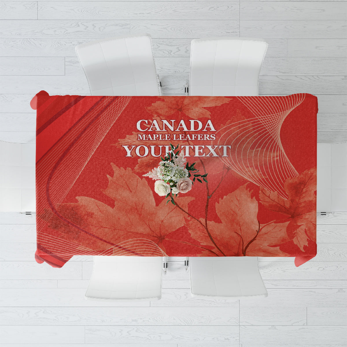 Red tablecloth with Canada Maple Leafs graphic and maple leaves