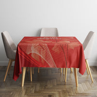 Red round tablecloth with maple leaf and abstract sports-themed pattern