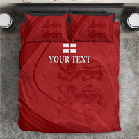 Red bedding set with matching pillowcases and printed lion crest design