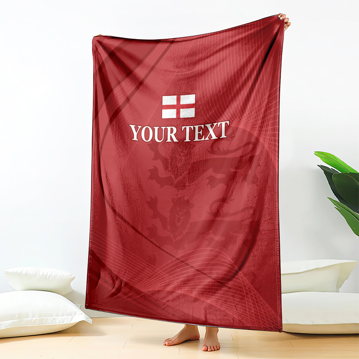 Red cricket blanket with white England emblem and 'YOUR TEXT' draped upright