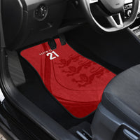 Red floor car mat with lion pattern and '21' text, angled cabin view
