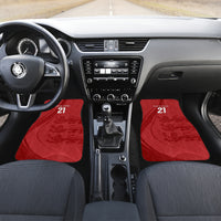 Red car floor mats set with lion motif and '21' on front mats, interior view