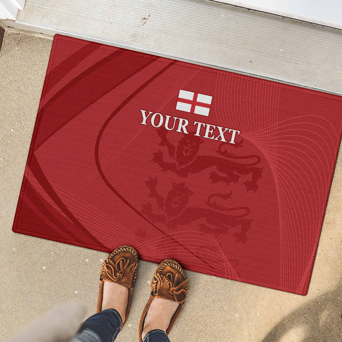 Red rubber doormat with YOUR TEXT lion crest design, with shoes on edge