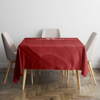 Red square tablecloth with England flag and crest print, hangs over table edges