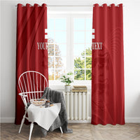 Red window curtains with custom text print and abstract emblem pattern, centered