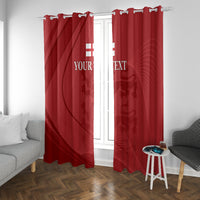 Red window curtains with custom text print and abstract emblem pattern, top-hung