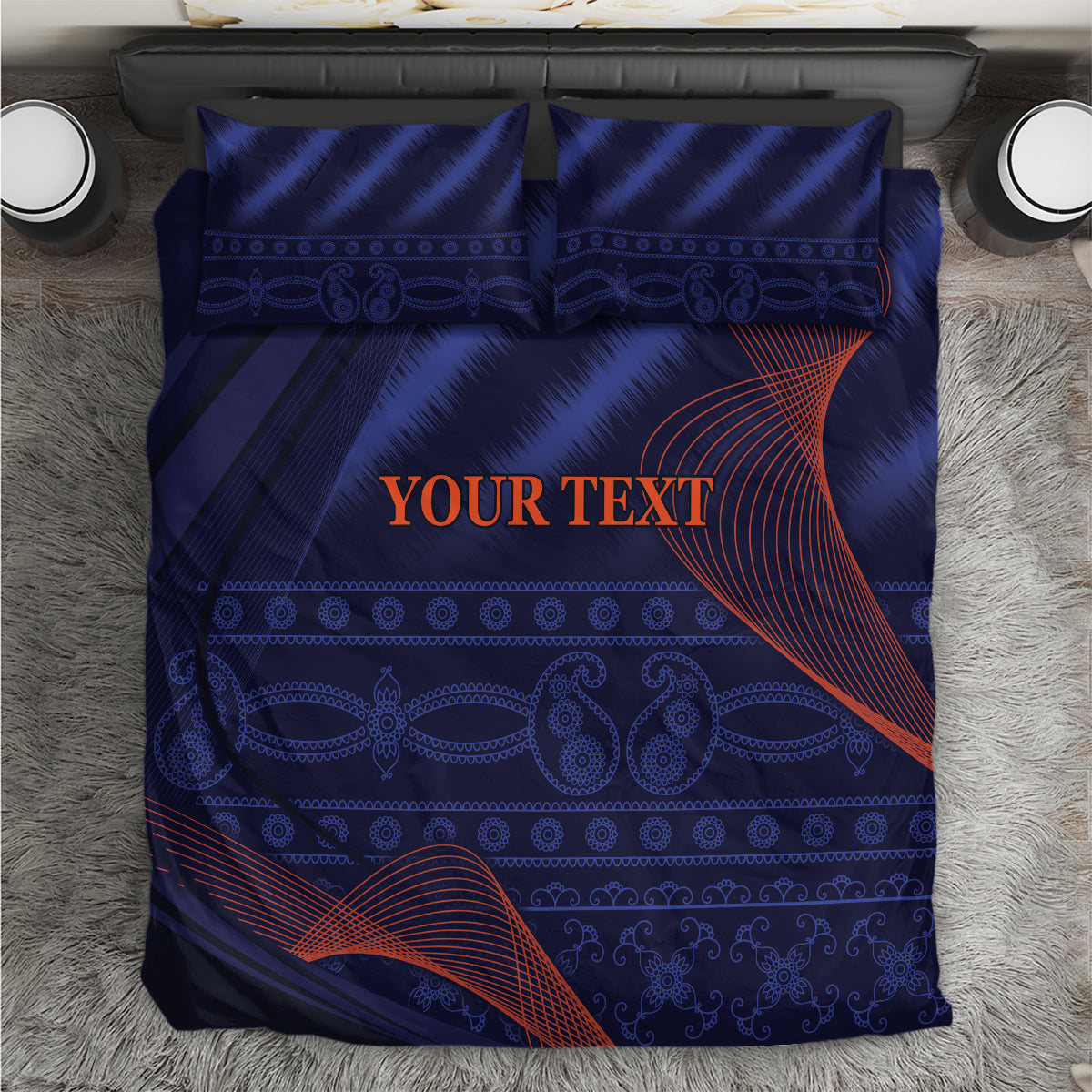 Blue bedding set with duvet and two pillowcases, geometric pattern with red-orange accents