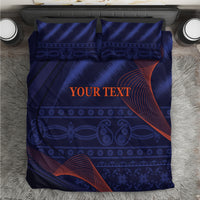 Blue bedding set with duvet and two pillowcases, geometric pattern with red-orange accents