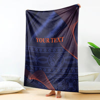 Folded blue blanket with red wave design and 'YOUR TEXT' printed