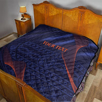 Blue comforter with red swirl design and “YOUR TEXT” lettering on the front