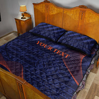 Blue quilt bed set with two pillowcases, orange 'Your Text' and red wave stripe at corner