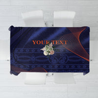 Blue tablecloth with dark ornamental pattern and orange-red swirl accents, “YOUR TEXT”