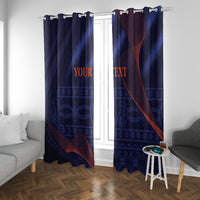 Blue window curtains with grommet-style top and red swirl pattern