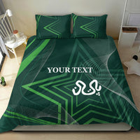 Green geometric bedding set on bed: duvet and two pillowcases with star print