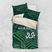 Green bedding set top view: duvet and two pillowcases with geometric star print