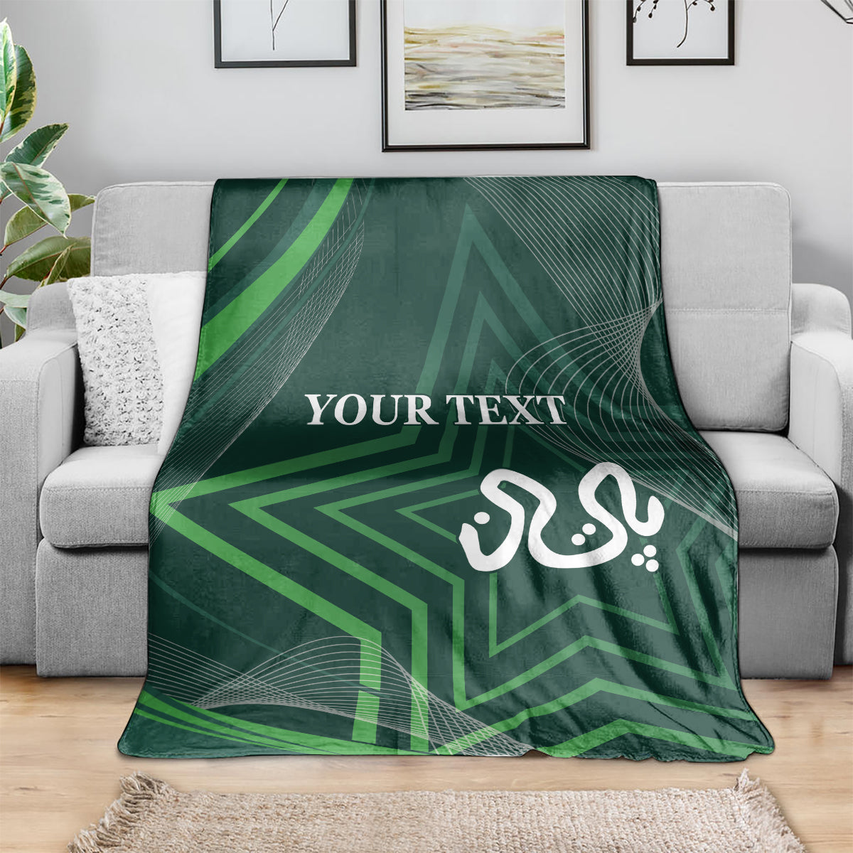 Green patterned blanket draped over a sofa, with “YOUR TEXT” and Arabic-style calligraphy