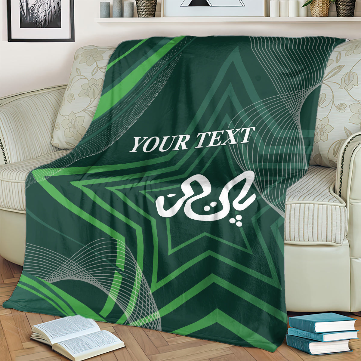 Green throw blanket on an armchair with “YOUR TEXT” text and star-like calligraphy