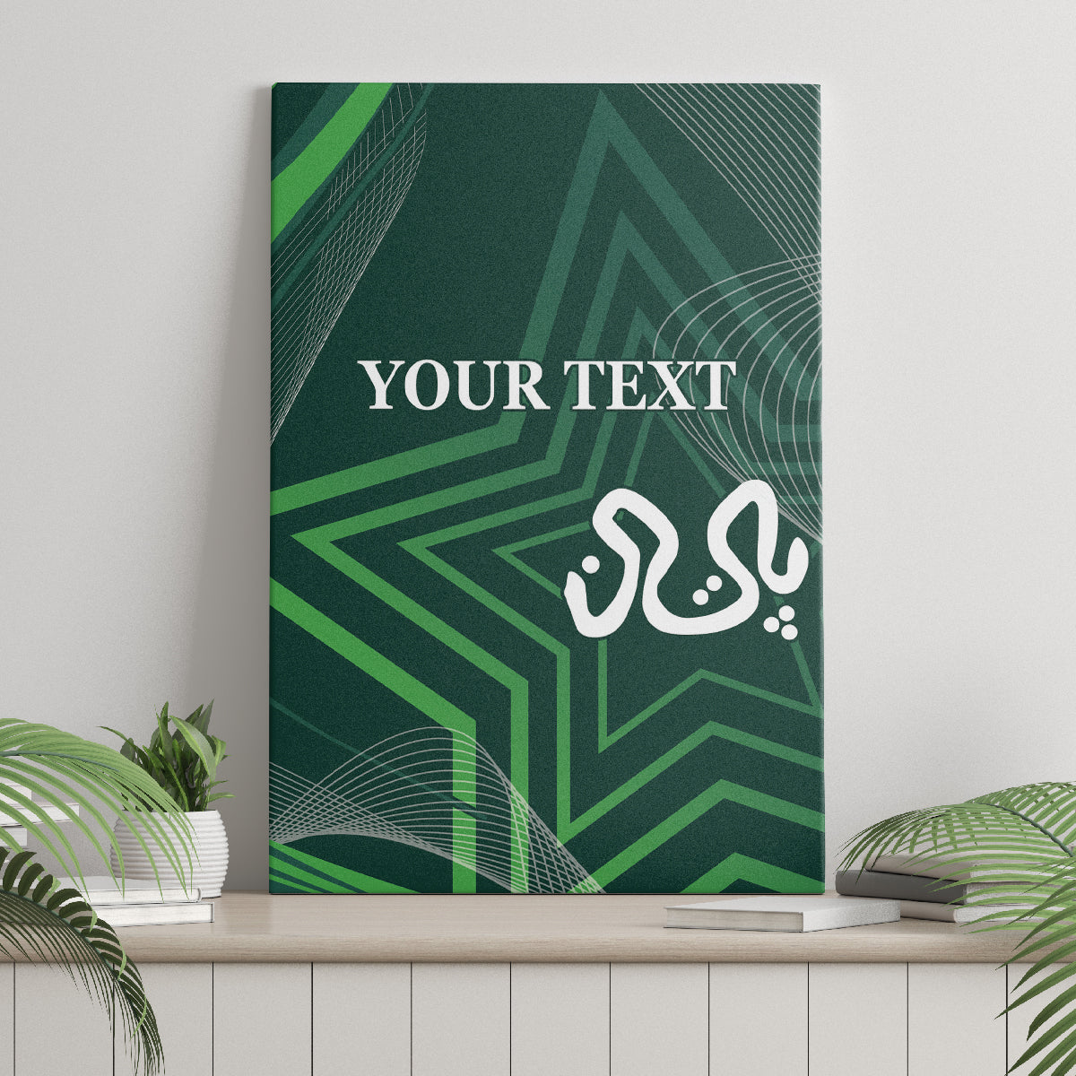 Green canvas wall art on a ledge, featuring geometric star pattern, “YOUR TEXT,” and calligraphy.