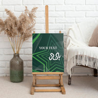 Green canvas wall art on an easel, with geometric star background, “YOUR TEXT,” and calligraphy.