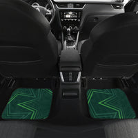 Green car floor mats with '21' and Arabic emblem, front seats view