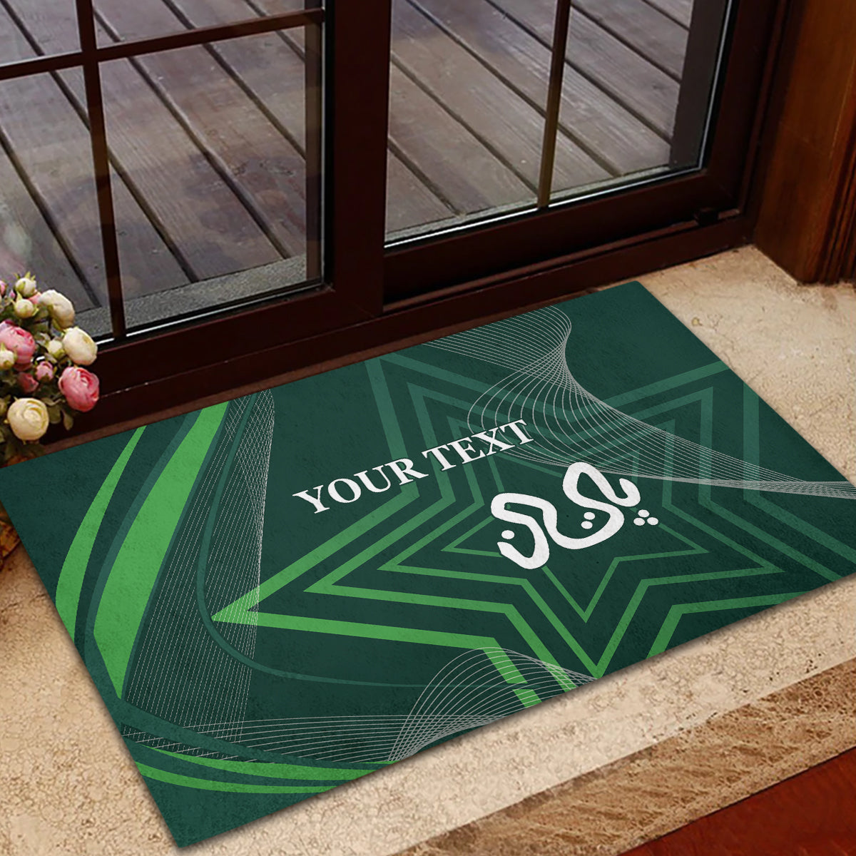 Green rubber doormat with geometric star, white 'YOUR TEXT' and decorative emblem