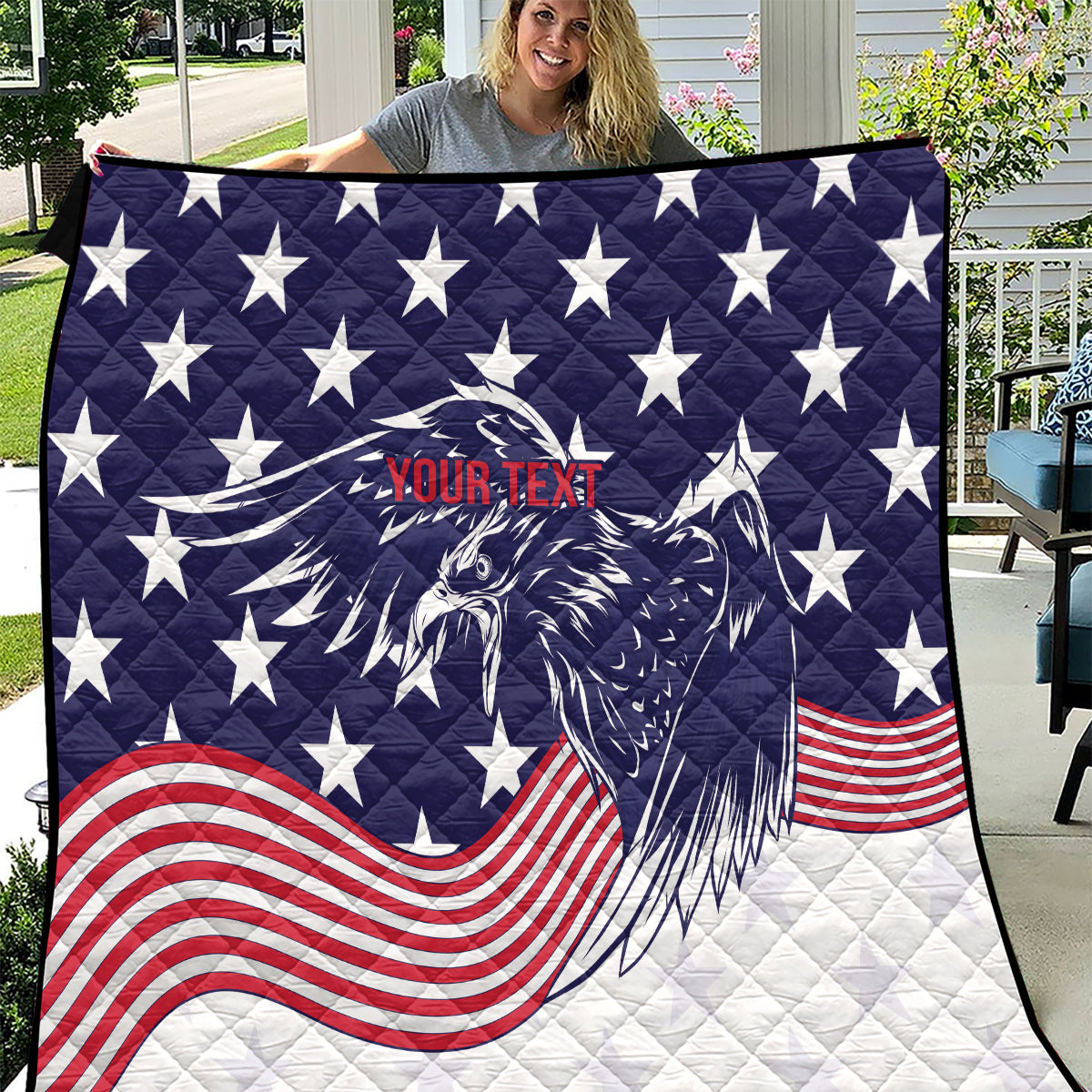 Quilt blanket with navy and white stars, red-white stripes, and eagle artwork