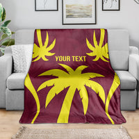 Maroon cricket-themed throw blanket draped on gray sofa, yellow burst pattern and "YOUR TEXT"
