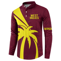 Maroon button-up sweatshirt with West Indies logo and yellow palm burst design