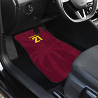 Maroon car floor mat with black border and 'YOUR TEXT 21' text, angled view