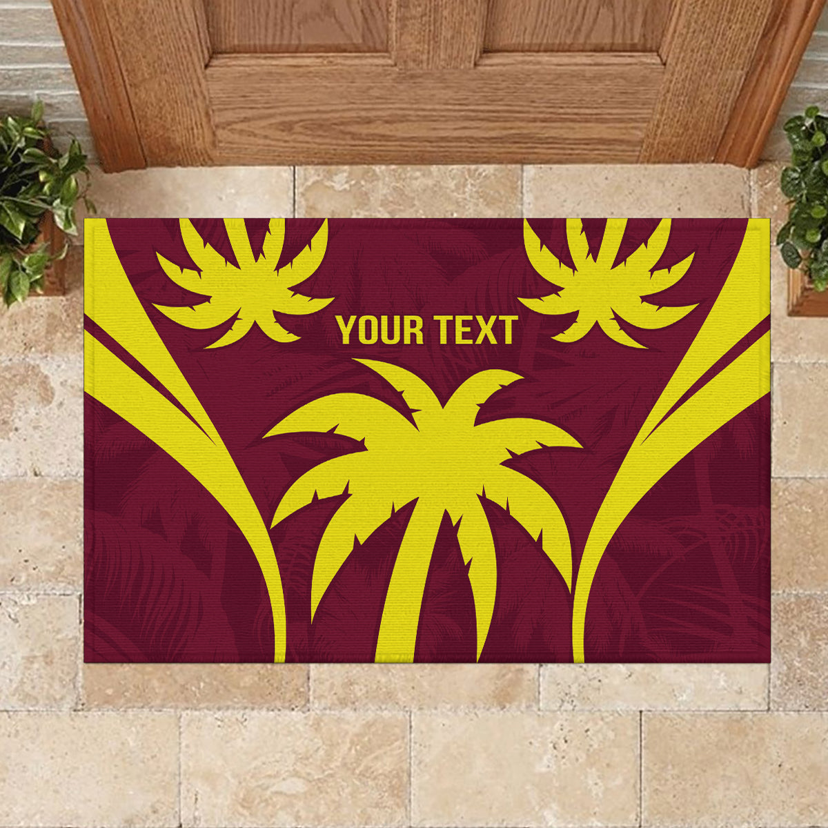 Maroon rubber doormat with large yellow palm motif and 'YOUR TEXT' on top